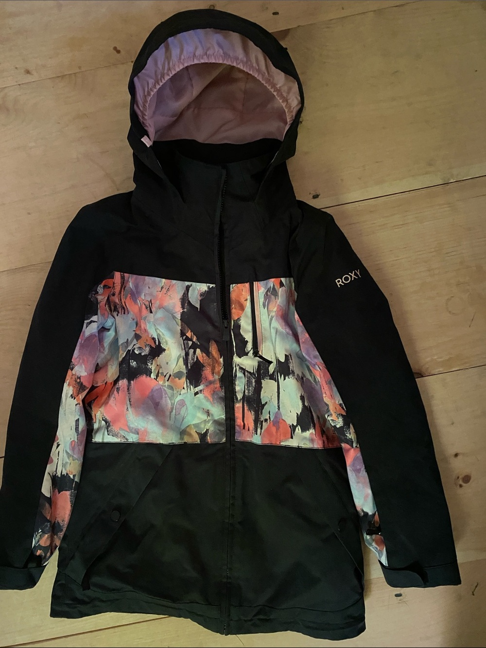 Like new girls size 12 Roxy Black Ski Jacket with Pastel Floral Panel